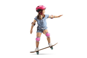 Little girl riding a skateboard with helmet, knee and elbow pads © Ljupco Smokovski