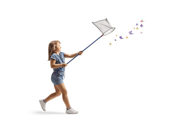 Little girl running and catching butterflies with a net