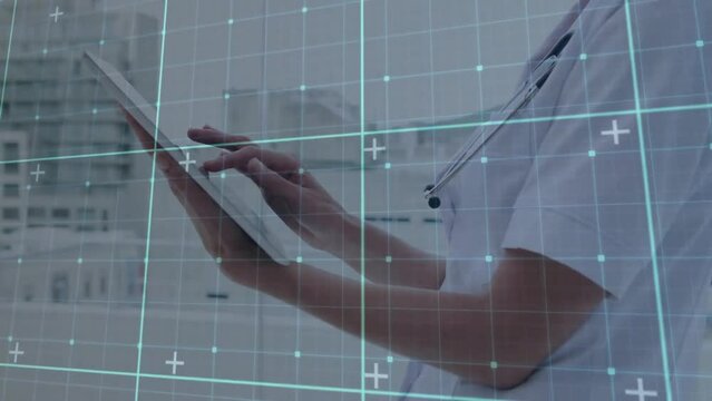 Animation of network of connections over caucasian female doctor using tablet