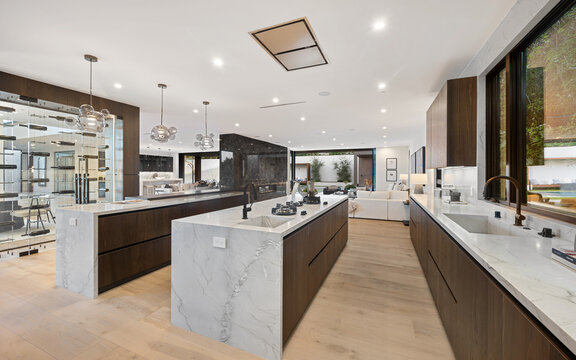 Modern kitchen with marble countertops and a central island