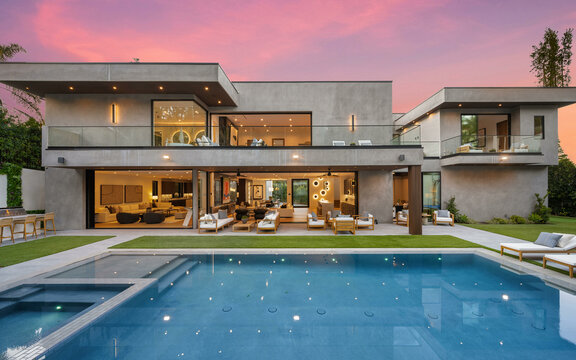 Modern home with a pool in the middle of the spacious yard
