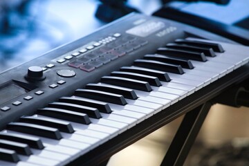 close-up of synthesizer keys on stage