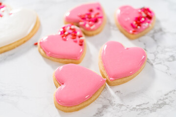 Heart-shaped sugar cookies with royal icing