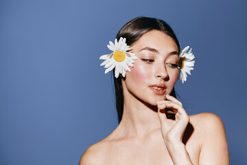 Fototapeta premium Beauty in Bloom: A Sensuous Floral Portrait of a Young Woman in Vogue Style