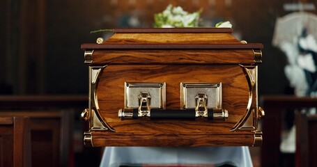 Casket, church and funeral with service in closeup, zoom or event to celebrate life, worship or faith. Wood coffin, burial and memory in death, mourning or compassion for farewell, temple or religion - obrazy, fototapety, plakaty