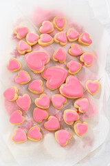 Heart-shaped sugar cookies with royal icing