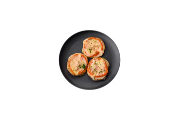 Delicious baked fish fillet with cheese, tomatoes, salt, spices and herbs