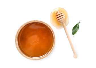 Tasty honey in bowl, dipper and green leaf on white background, flat lay. Space for text