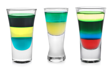 Different shooters in shot glasses isolated on white, set