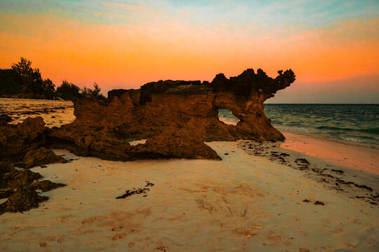 View of watamu beach sunset against a coral rock in Waatamu, Malindi, Kenya