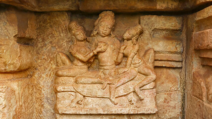 Ancient Sculpture of God With Maids on the Bhima Kichak Temple, Malhar, Bilaspur, Chhattisgarh, India... - obrazy, fototapety, plakaty
