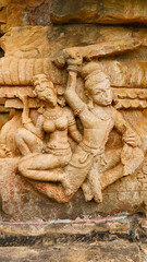 Sculpture of Man Protecting a Women on the Bhima Kichak Temple, Malhar, Bilaspur, Chhattisgarh, India... - obrazy, fototapety, plakaty