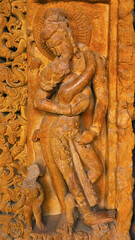 Loving Couple Sculpture on the Entrance of Teevardeo Buddhist Monastery, Sirpur, Mahasamund, Chhattisgarh, India...