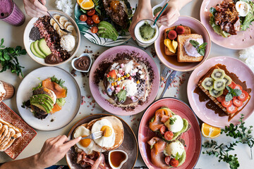 Brunch Choice Crowd Food Concept. Family breakfast or brunch served on a table. Aerial view.