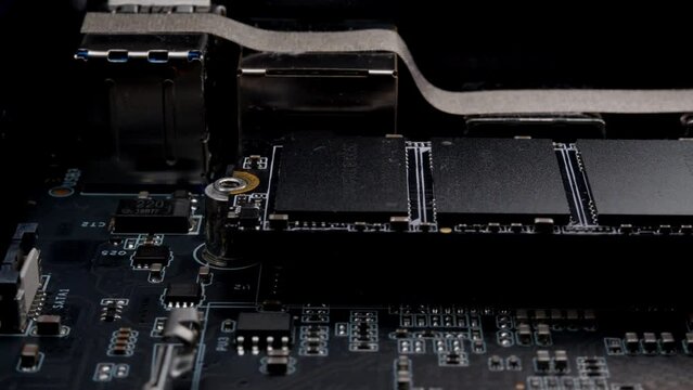 Install MSATA nvme M2 with a screwdriver for connecting fast modern SSD. High quality 4k footage