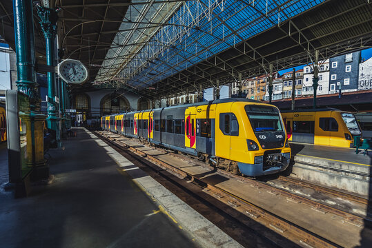 Porto, Portugal - December 9, 2016: Comboios de Portugal trains on a platforms of Sao Bento railway station in Porto city