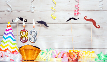 Birthday with number  83. Date of birth with number and candles, copy space. Anniversary background...