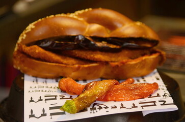 Sabich sandwich, eggplant and chicken schnitzel in challah. Tel Aviv street food.