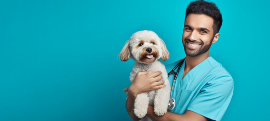 A Man Veterinarian hold dog with love and smile, Doctor's day , Pets and animals.