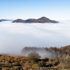 Beautiful sea of clouds above the mountains of the Basque Country. Spain. Square format.  - 730954165