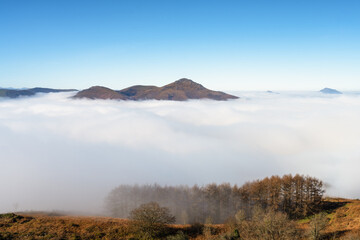 Beautiful sea of clouds above the mountains of the Basque Country. Spain. - 730954176