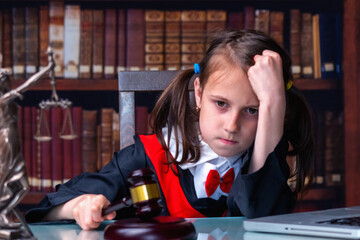 Remorse of female judge (lawyer). Humorous photo.
