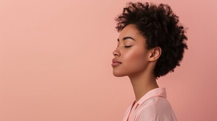A serene portrait of a person with closed eyes showcasing a side profile against a soft pink background with a focus on the gentle contours of the face and the texture of the hair. - obrazy, fototapety, plakaty