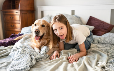 Joyful Little Girl Playing With Golden Retriever Dog And Stick Out The Tongues