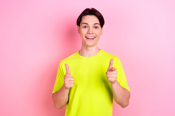 Photo portrait of pretty teen man point you excited wear trendy yellow clothes isolated on pink...