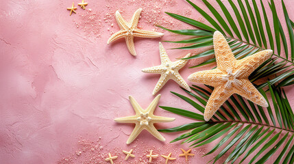 Fototapeta na wymiar A big copy space with starfish and palm leaf on pink background