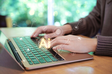 Woman use laptop to work on AI and artificial intelligence automation. Computer connection with...