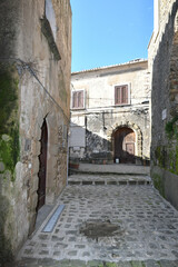 A narrow street in Castellabate, a medieval village on the coast of Campania, Italy..