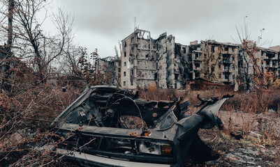 damaged and looted cars in a city in Ukraine during the war