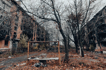 destroyed and burned houses in the city during the war in Ukraine