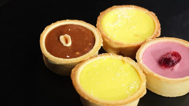 Traditional desserts. Traditional Eid Mamool or Mamool cookies with dates, nuts and jam, Arabic sweets.