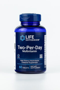 Two-per-day editorial. Two per day multivitamin pills