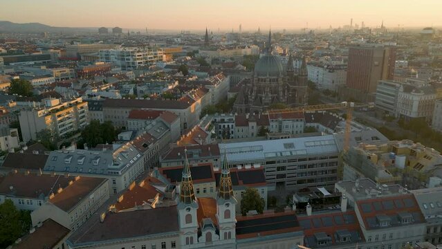 Vienna aerial skyline view fly over drone footage of city vienna austria at sunset fly over city centre street traffic top view.