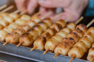 Mitarashi Dango are traditional Japanese rice dumplings on a bamboo skewer coated in a sweet soy glaze.