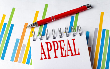 APPEAL text on a notebook with chart and pen business concept