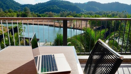 Laptop work remote remote office computer IT, travel with laptop office with lake mountains and...