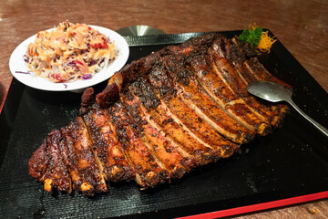 Grilled iberico or iberian pork ribs is a favorite food in Chinese restaurant during festive dining in restaurants