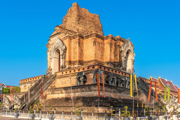Wat Chedi Luang is a Buddhist temple and a main attraction in the city of Chiang Mai, Thailand....