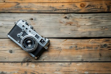 Vintage camera on a rustic wooden surface