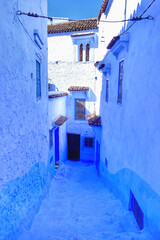 Traditional houses along alleyway in Chefchaouen, Morocco