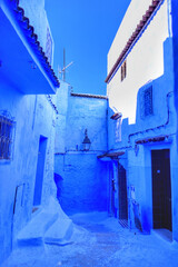 Traditional houses along alleyway in Chefchaouen, Morocco