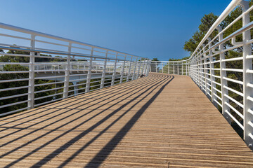 modern pedestrian bridge over the highway from the Technion University to the nature reserve.