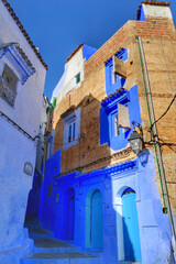 Traditional houses along alleyway in Chefchaouen, Morocco
