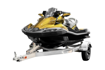 Golden watercraft on trailer