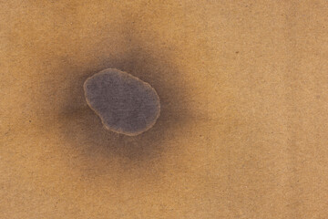 Old burnt paper with stains