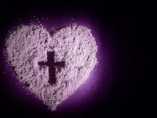 Lent Season, Holy Week, Ash Wednesday concepts.Ash heart with cross symbol in purple and black...
